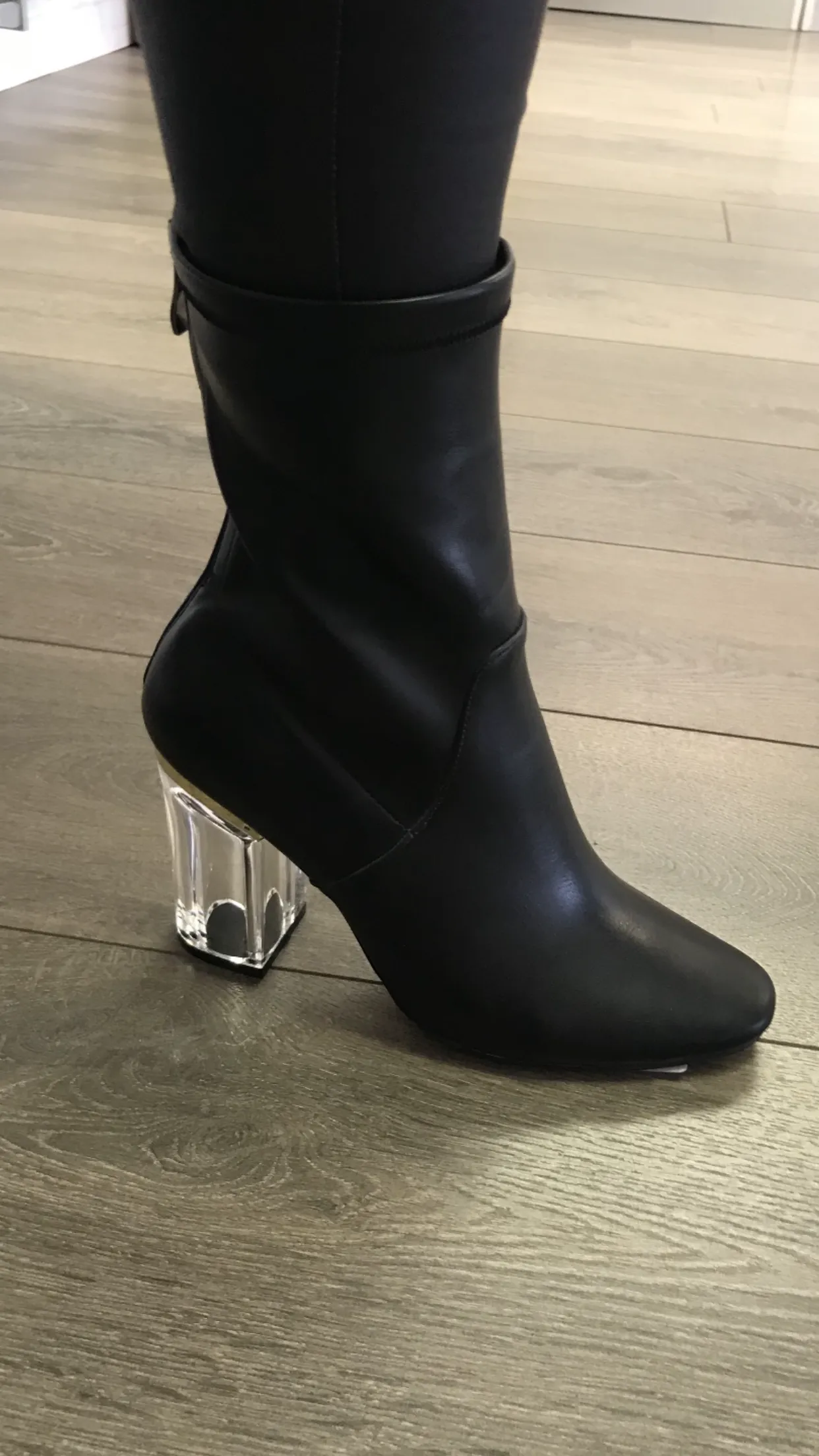 Leather look sock boots with Perspex heels